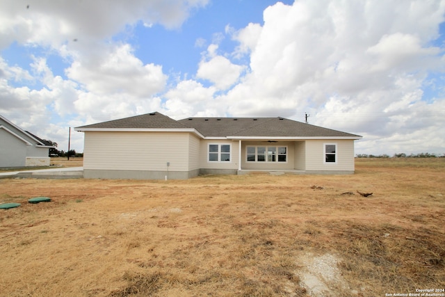 rear view of house featuring a patio