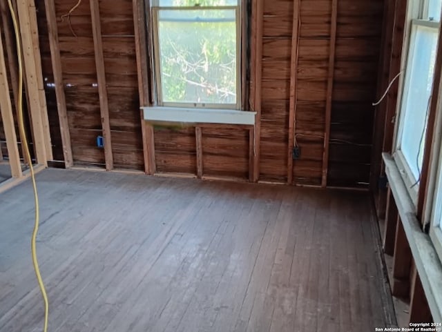 miscellaneous room with dark hardwood / wood-style floors