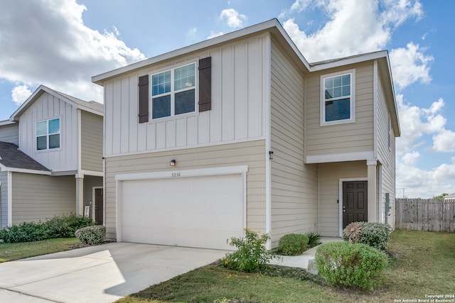 view of front of home with a garage