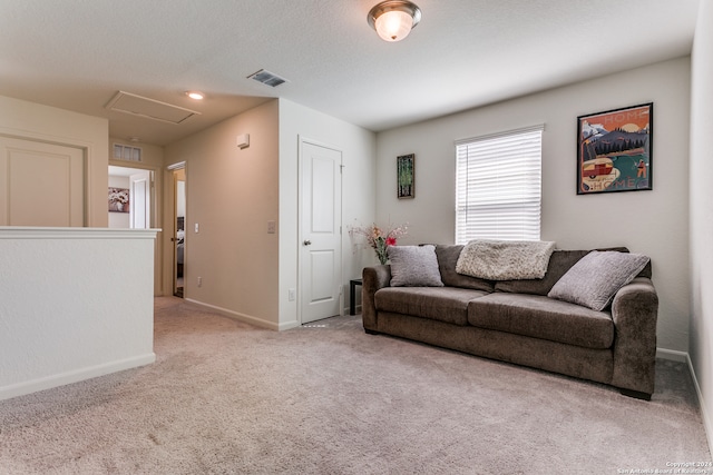 living room with light colored carpet