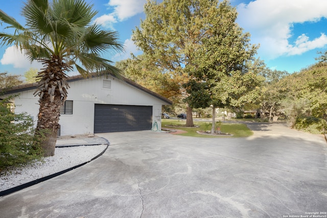 view of home's exterior featuring a garage