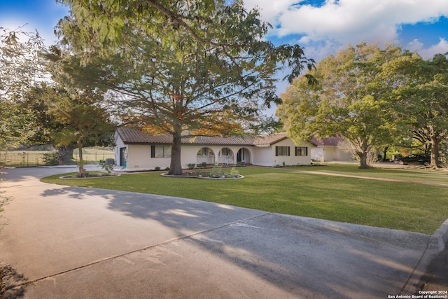 view of front of home with a front yard