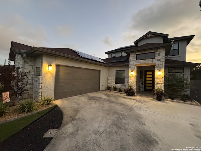 view of front of home featuring a garage