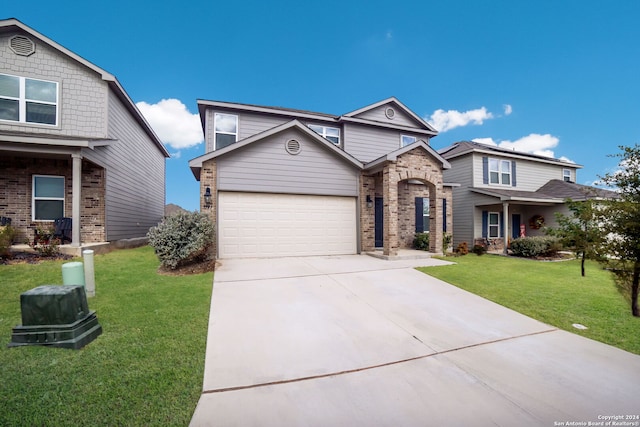 view of front of property with a garage, concrete driveway, a front lawn, and brick siding