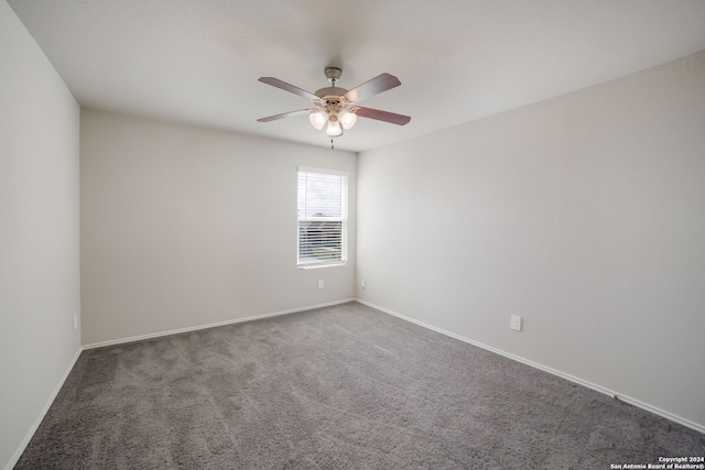 empty room with carpet and ceiling fan