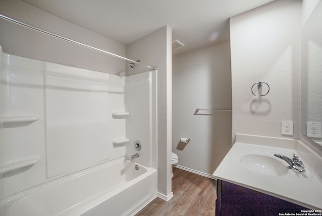 full bathroom featuring shower / bathing tub combination, vanity, toilet, and wood-type flooring