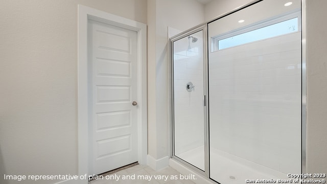 bathroom featuring walk in shower