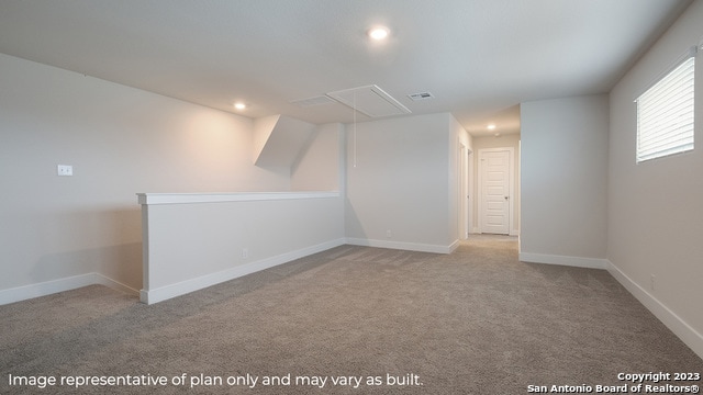 basement with carpet, recessed lighting, and baseboards
