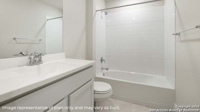 bathroom featuring toilet, vanity,  shower combination, and tile patterned flooring