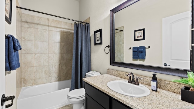 full bathroom featuring toilet, shower / tub combo with curtain, and vanity