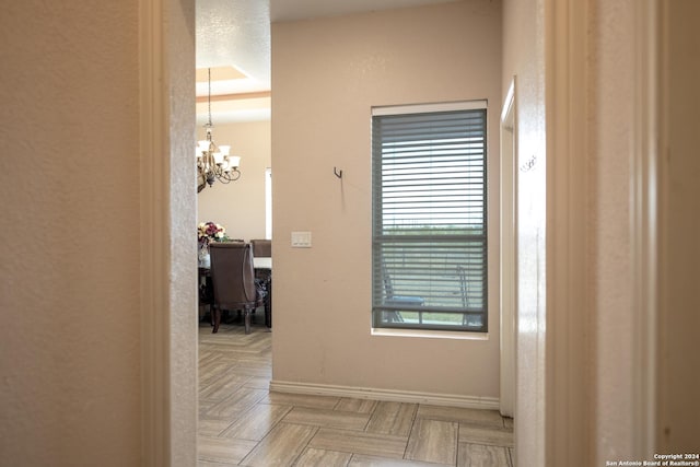 2989 Graytown, Converse, TX 78109 - corridor featuring baseboards and a chandelier