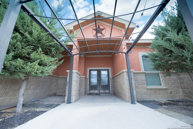 2989 Graytown, Converse, TX 78109 - view of exterior entry with french doors and stucco siding
