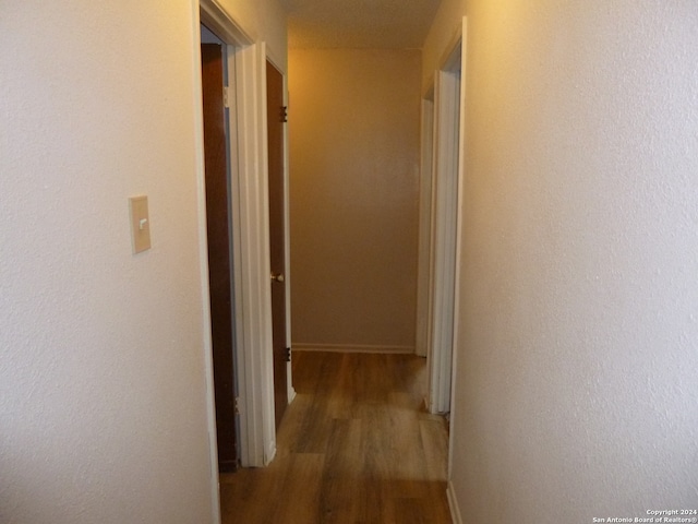 hall featuring dark hardwood / wood-style flooring