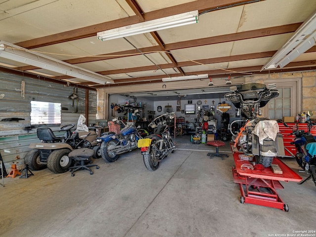 garage with a workshop area