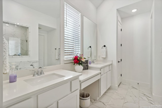 bathroom featuring vanity and a shower with shower door