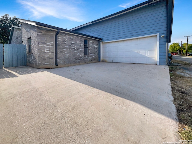 exterior space with a garage