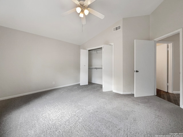 unfurnished bedroom featuring a closet, ceiling fan, carpet flooring, and lofted ceiling