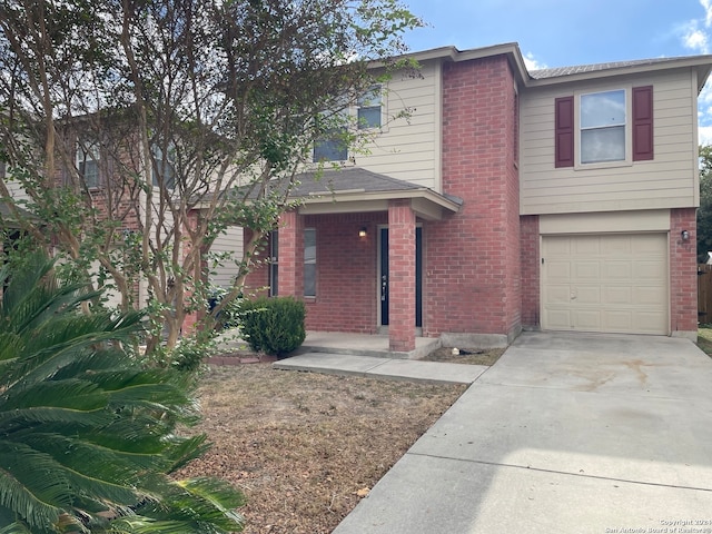 view of front of home with a garage