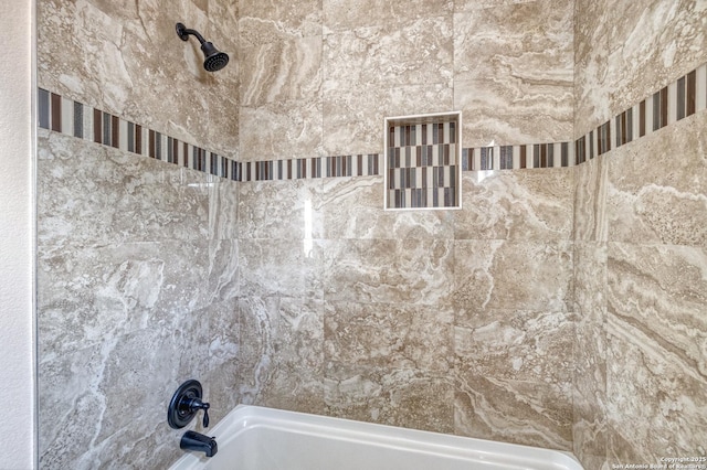 144 W Brazos St, Uvalde, TX 78801 - bathroom featuring tub / shower combination