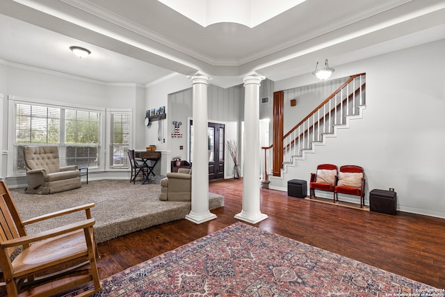 living room featuring ornamental molding and dark hardwood / wood-style floors