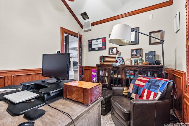 carpeted office with ornamental molding, lofted ceiling, and wooden walls