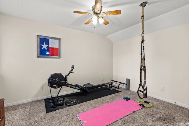 exercise area with ceiling fan, carpet flooring, and vaulted ceiling