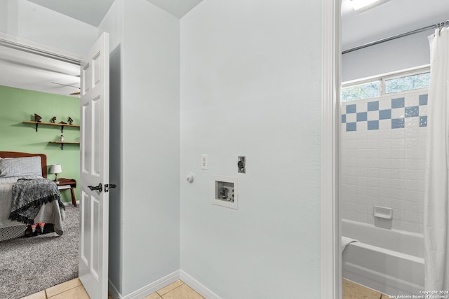 washroom with hookup for a washing machine, electric dryer hookup, and light tile patterned floors