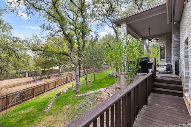 deck featuring a yard