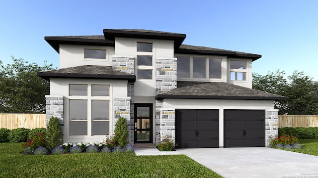 prairie-style home with a front yard and a garage