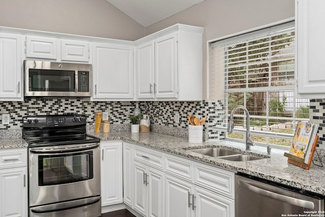 kitchen with sink, white cabinets, and stainless steel appliances