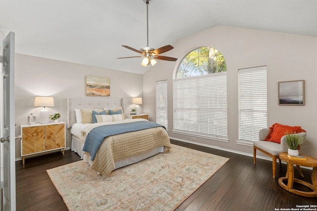 bedroom with dark wood-type flooring, ceiling fan, and lofted ceiling