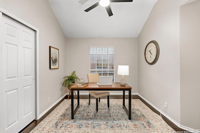 office area featuring vaulted ceiling, wood-type flooring, and ceiling fan