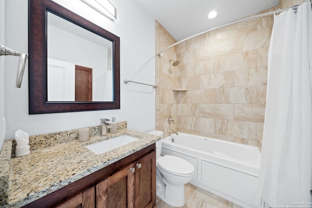 full bathroom with vanity, toilet, and shower / bath combo with shower curtain