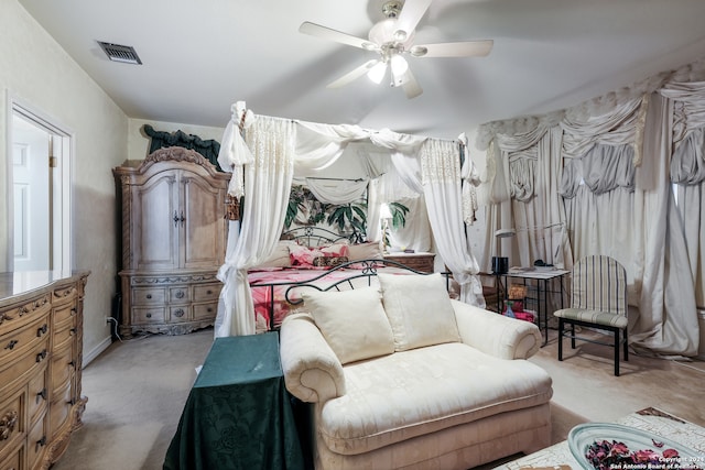 bedroom with light colored carpet and ceiling fan