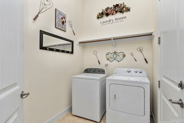 laundry area featuring washing machine and dryer