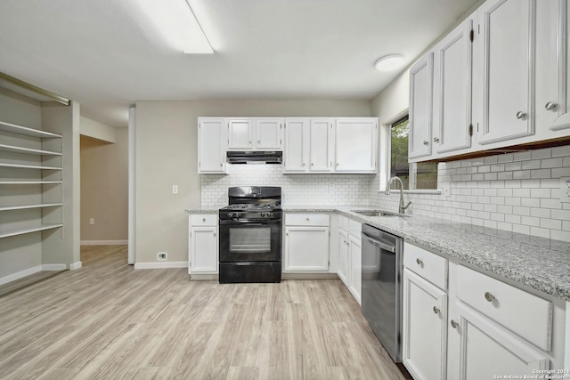 kitchen featuring black range with gas stovetop, dishwasher, and white cabinets