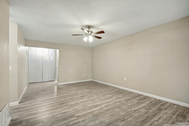 interior space with light hardwood / wood-style floors and ceiling fan