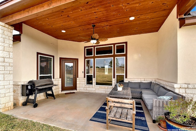 view of patio with outdoor lounge area, area for grilling, and ceiling fan