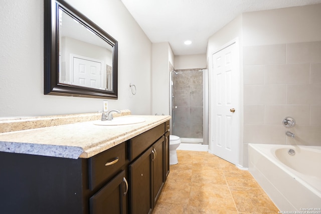 full bathroom with toilet, vanity, separate shower and tub, and tile patterned flooring