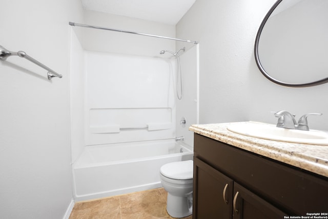 full bathroom with vanity, toilet, tile patterned floors, and washtub / shower combination