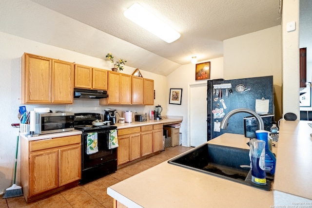 kitchen with a textured ceiling, black electric range oven, light tile patterned floors, sink, and lofted ceiling