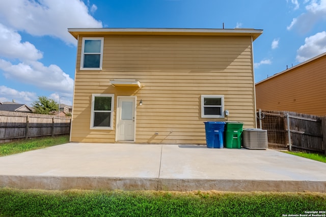 back of house with a patio