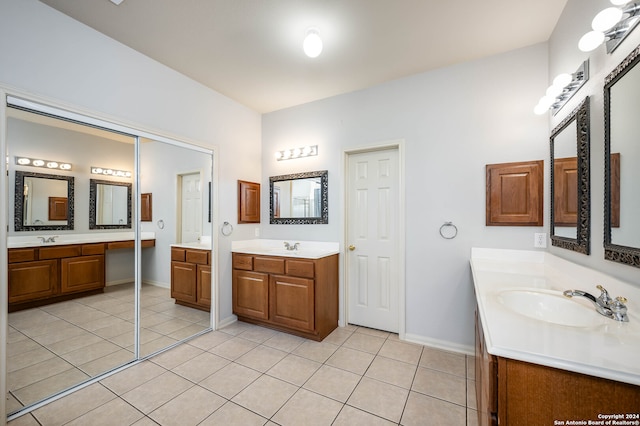 bathroom with vanity and tile patterned floors