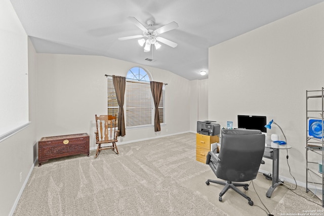 home office with ceiling fan, light carpet, and vaulted ceiling