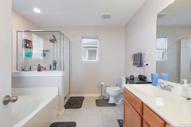 full bathroom with vanity, plus walk in shower, toilet, and tile patterned floors