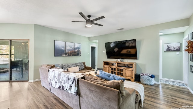 7935 Sonny Rdg, San Antonio, TX 78244 - living area featuring wood finished floors, ceiling fan, and baseboards