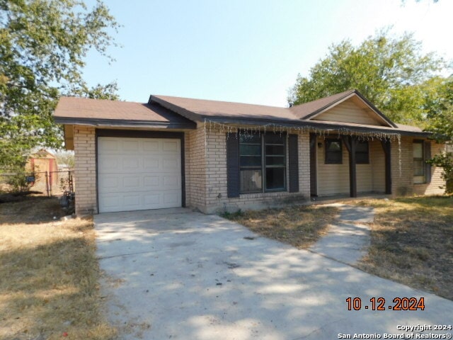 single story home with a garage