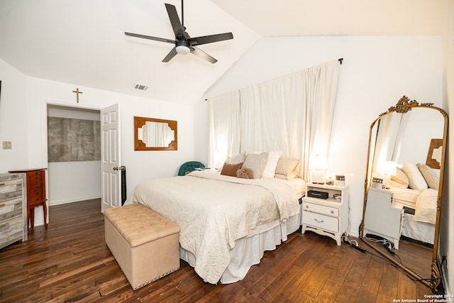 bedroom with ceiling fan, dark hardwood / wood-style flooring, and lofted ceiling