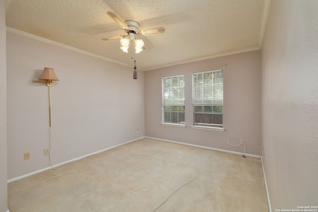 spare room with light carpet, a textured ceiling, and ceiling fan