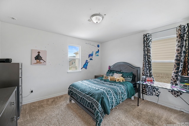 bedroom featuring carpet